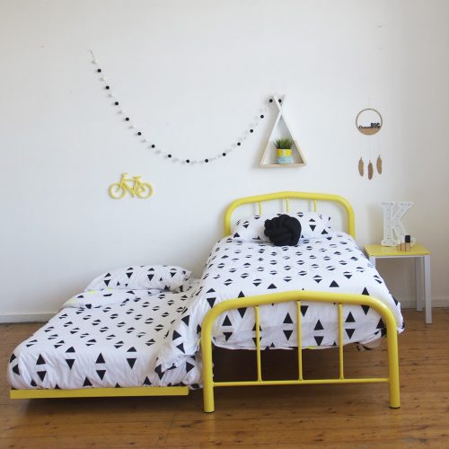 yellow steel frame kids bed with trundle bed pull out by Hypersonic Industries Australia